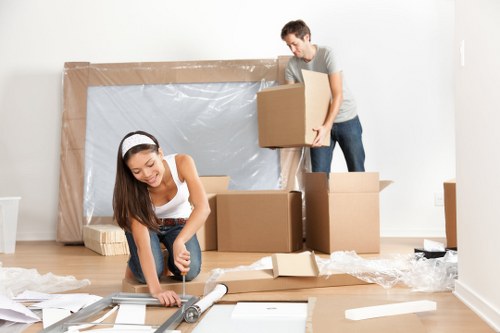 Loading furniture and boxes into a moving truck in Mayfair