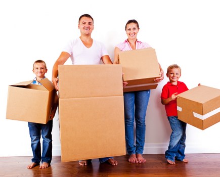 Packed boxes and furniture prepared for a central London removal