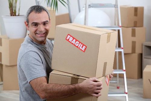 Removal team planning a house move in a Mayfair street