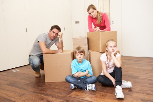 Careful loading of furniture and boxes into a removals van