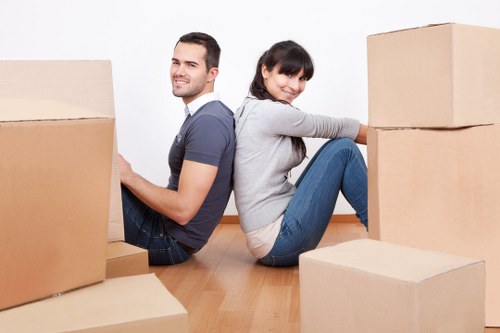 Trained movers using safe lifting techniques in Mayfair
