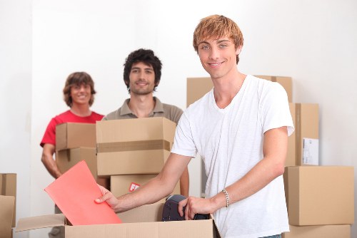 Professional movers handling furniture in central London