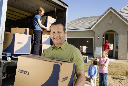 Professional Mayfair movers securing items for transport