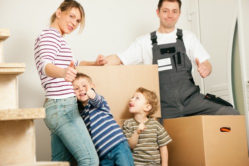 Office movers handling desks and equipment in Mayfair